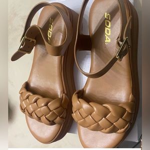 Soda tan braided platform sandals.